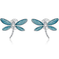 Enchanting dragonfly with zirconia and green wings made...