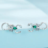 Special scorpion stud earrings with green zirconias made of 925 silver