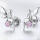 Special fairy stud earrings made of 925 silver sit on a pink zirconia