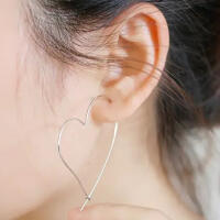 Extraordinary large hoop earrings in heart shape made of...