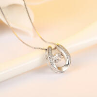 Necklace horseshoe with a dancing cubic zirconia