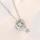Necklace with a star and a dancing cubic zirconia